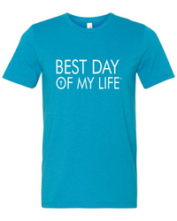 aqua crewneck t-shirt with best day of my life written in white with a cross in the O