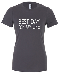 grey fitted crewneck t-shirt with best day of my life written across in white with a cross in the O