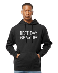dark skinned person wearing black pullover hoodie with best day of my life written in white and a cross in the O