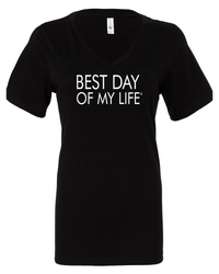 fitted black v-neck t-shirt with best day of my life written across in white