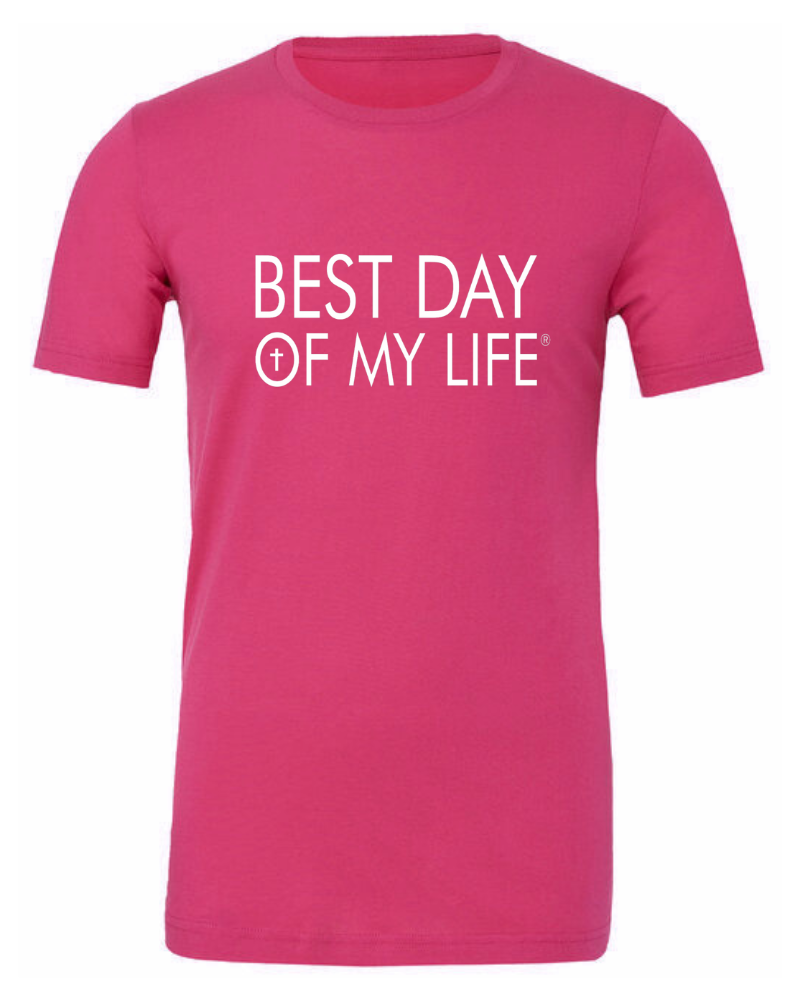 bright pink crewneck t-shirt with best day of my life written in white with a cross in the O