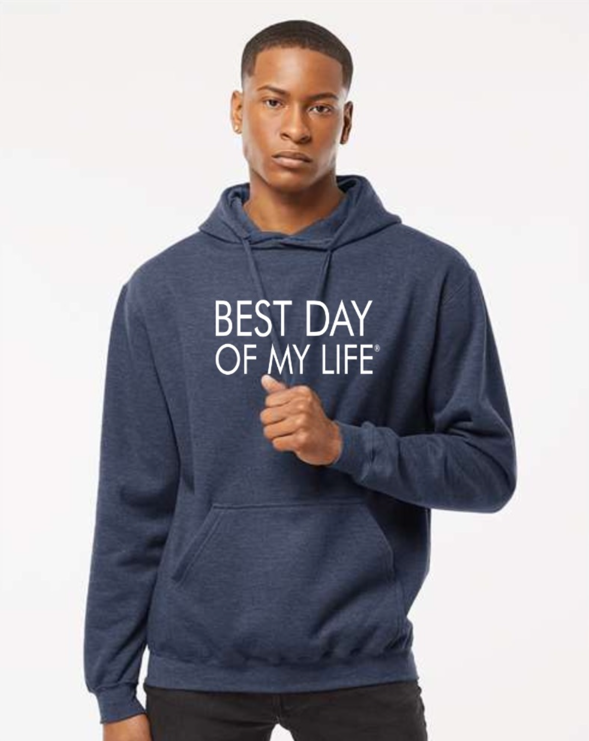 dark-skinned person with short hair wearing a blue pullover hoodie with best day of my life written in white