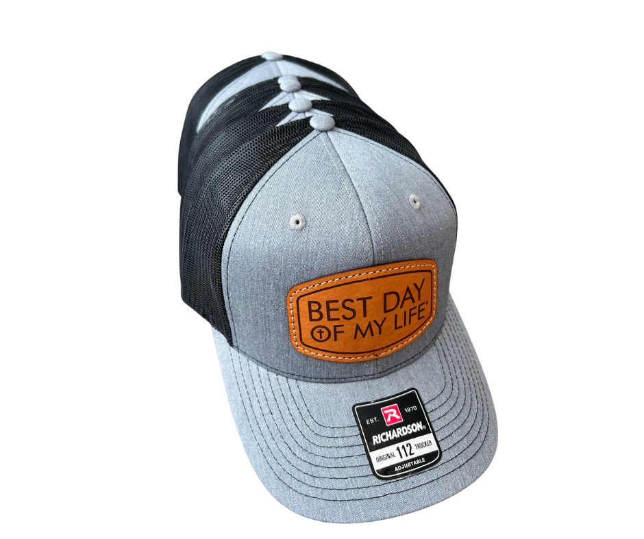 Gray and black cap with leather patch and Richardson logo on a white background